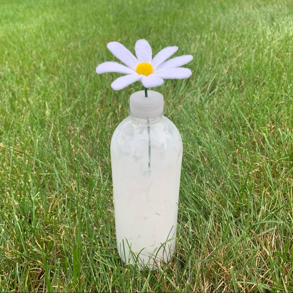 White Felt Daisy and Painted Plastic White Vase